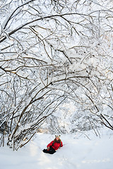 Image showing young girl playing in snow
