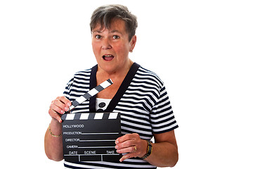 Image showing Senior woman with clapperboard