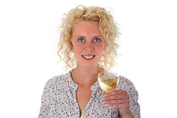 Image showing Young woman drinking white wine
