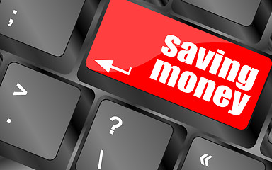 Image showing saving money for investment with a button on computer keyboard