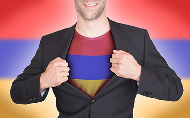 Image showing Businessman opening suit to reveal shirt with flag