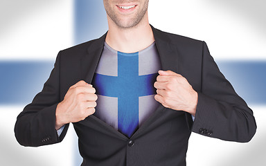 Image showing Businessman opening suit to reveal shirt with flag