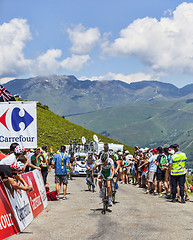 Image showing Group of Cyclists at the Realimentation Point