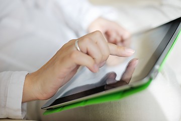 Image showing woman using tablet pc at home