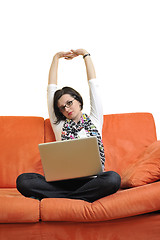 Image showing woman using a laptop computer at home