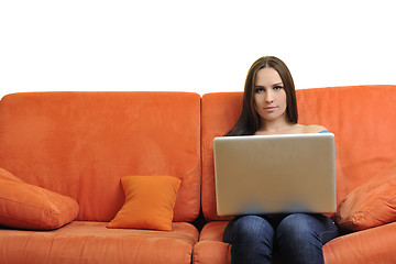 Image showing woman using a laptop computer at home