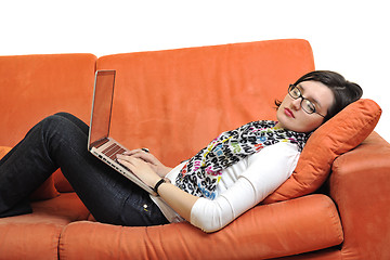 Image showing woman using a laptop computer at home