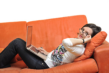 Image showing woman using a laptop computer at home