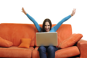 Image showing woman using a laptop computer at home