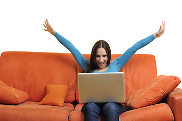 Image showing woman using a laptop computer at home