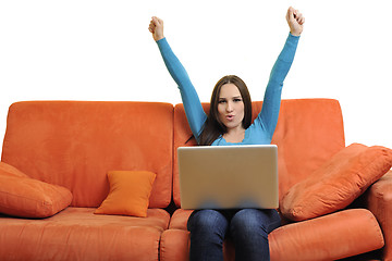 Image showing woman using a laptop computer at home