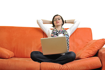Image showing woman using a laptop computer at home