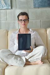 Image showing woman using tablet pc at home