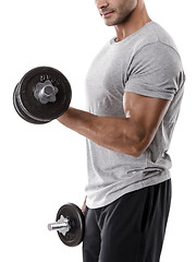 Image showing Athletic man lifting weights