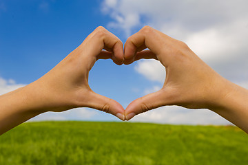 Image showing Hands making a heart shape