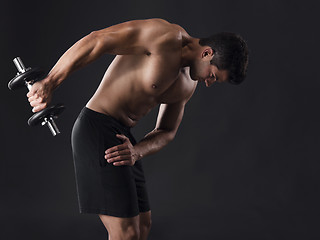 Image showing Muscular man lifting weights