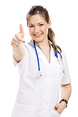 Image showing Beautiful young veterinary with thumbs up, isolated over white b