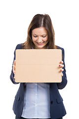 Image showing Business woman holding a cardboard