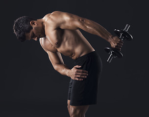 Image showing Muscular man lifting weights