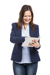 Image showing Business woman working with a tablet