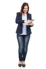 Image showing Business woman working with a tablet