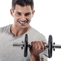 Image showing Athletic man lifting weights