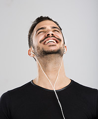 Image showing Happy man listen music