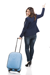 Image showing Business woman carrying a suitcase