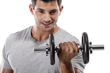 Image showing Athletic man lifting weights