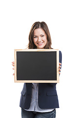 Image showing Business woman holding a chalkboard