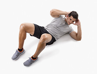 Image showing Man doing abdominals