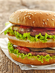 Image showing burger on wooden table