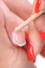 Image showing manicure applying - cleaning the cuticles 