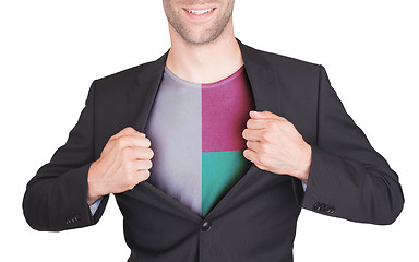 Image showing Businessman opening suit to reveal shirt with flag