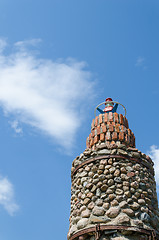 Image showing cobblestone lighthouse tower blue sky background 