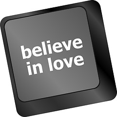 Image showing keyboard key with believe in love text and arrow