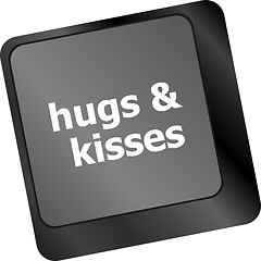 Image showing hugs and kisses words on computer keyboard keys