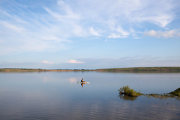 Image showing Little surfer on the lake