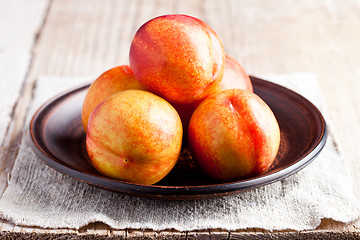 Image showing fresh nectarines in a plate