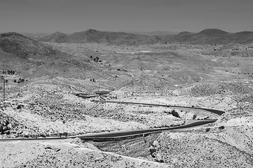 Image showing Road passing through Sahara desert black and white