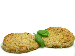 Image showing Round flat potato dough cakes with basil