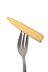 Image showing Baby corn held by a fork