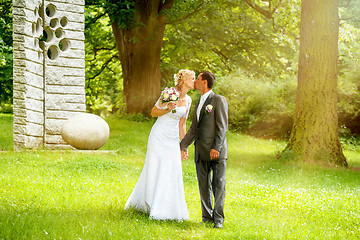 Image showing beautiful young wedding couple kissing