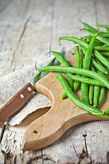 Image showing green string beans and knife