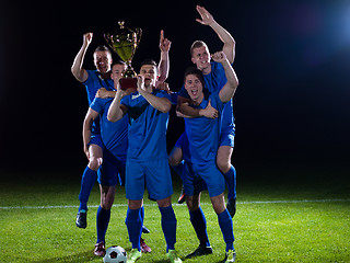 Image showing soccer players celebrating victory