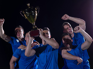 Image showing soccer players celebrating victory