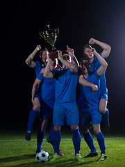 Image showing soccer players celebrating victory