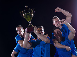 Image showing soccer players celebrating victory