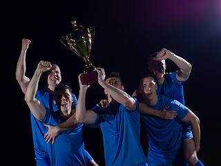 Image showing soccer players celebrating victory