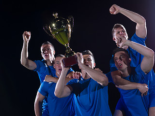 Image showing soccer players celebrating victory